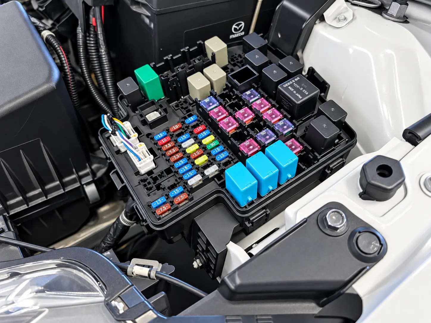 Under-hood fuse and relay box during electrical diagnosis